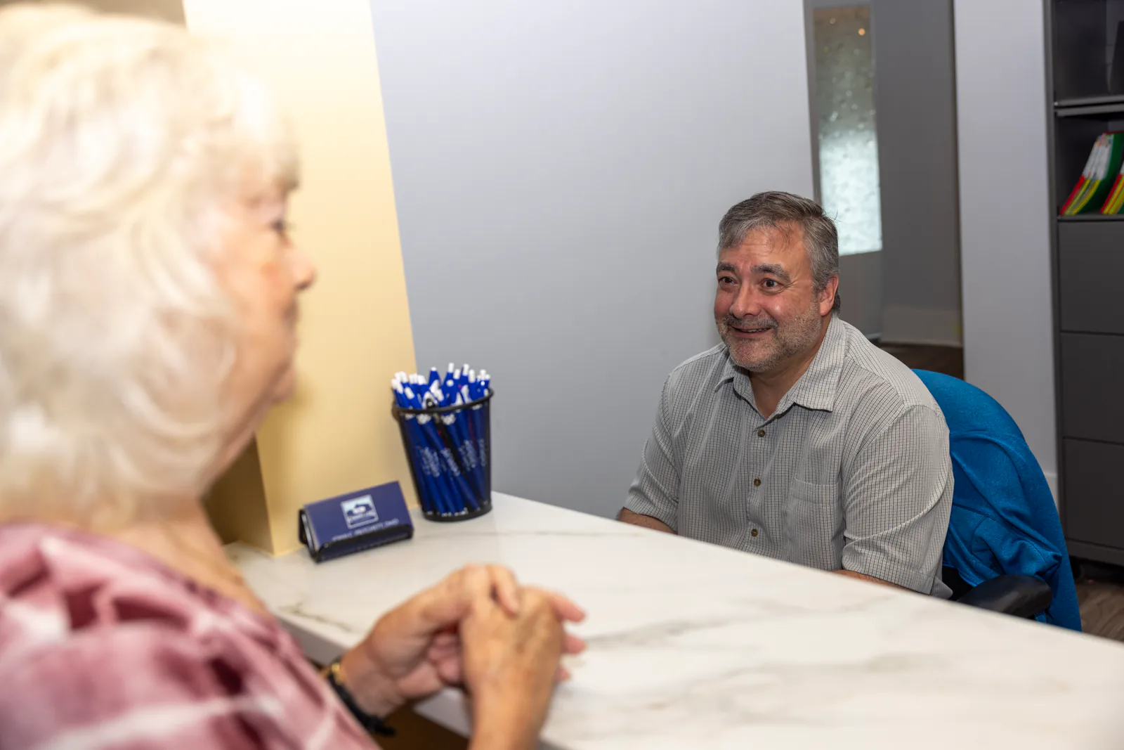 Patients meeting with the Cherry Log Oral Surgery team for a consultation